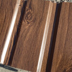 Фасад із профнастилу з 10 під дерево горіх 1170 мм ширина аркуша